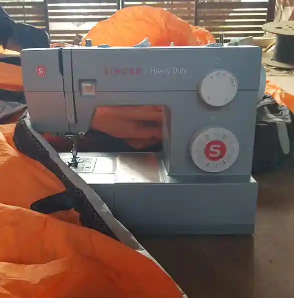 JBay Kitesurfing Curaçao | Lessen & Reparaties 22 Sewing kite canopy repairs at JBay Kiteboarding Curaçao